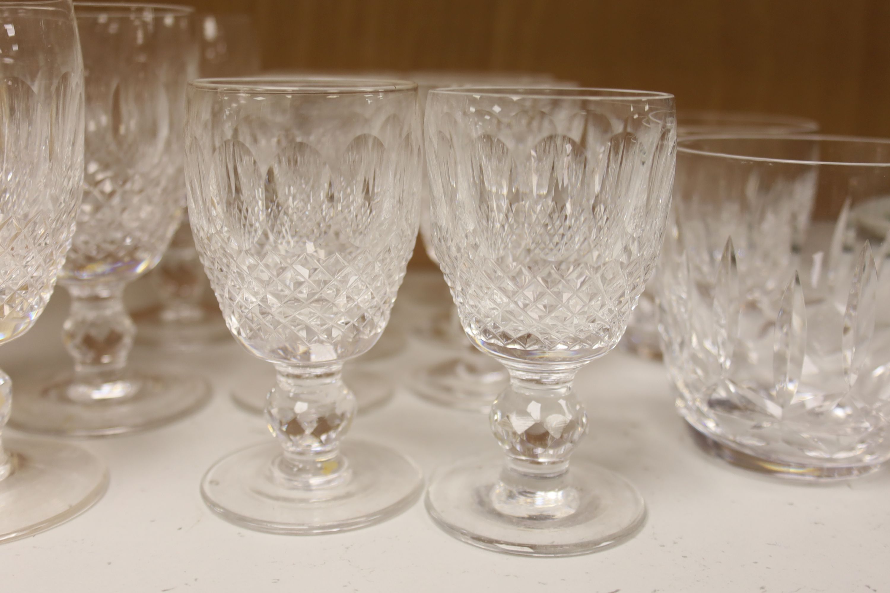 A collection of Waterford Colleen cut glasses and port glasses and two Lismore cut tumblers